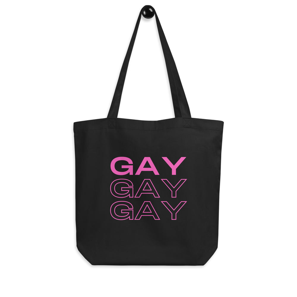 Front view of a black tote bag with three pink “GAY” lines and long handles