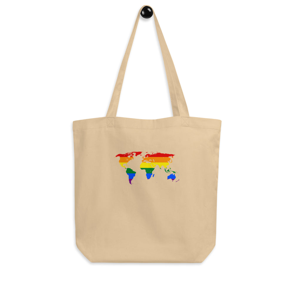 Front-facing beige tote bag with long handles and a rainbow-colored world map graphic