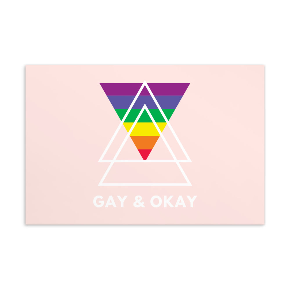 Pink postcard with a rainbow-striped inverted triangle and white triangle outlines, reading “GAY & OKAY”