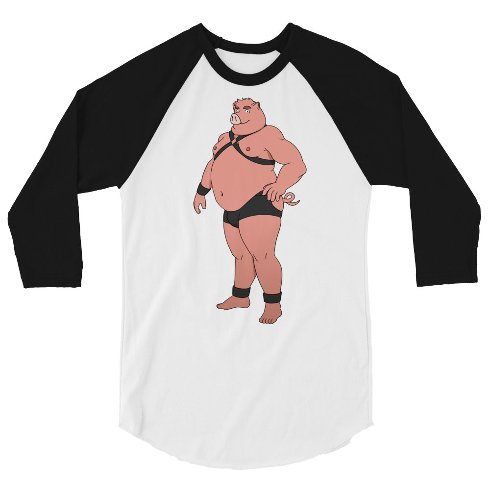 Gay Pig 3/4 Sleeve Raglan Shirt with a cartoon wrestler, worn by a smiling woman at Pride amid rainbow flags, sun, and confetti.