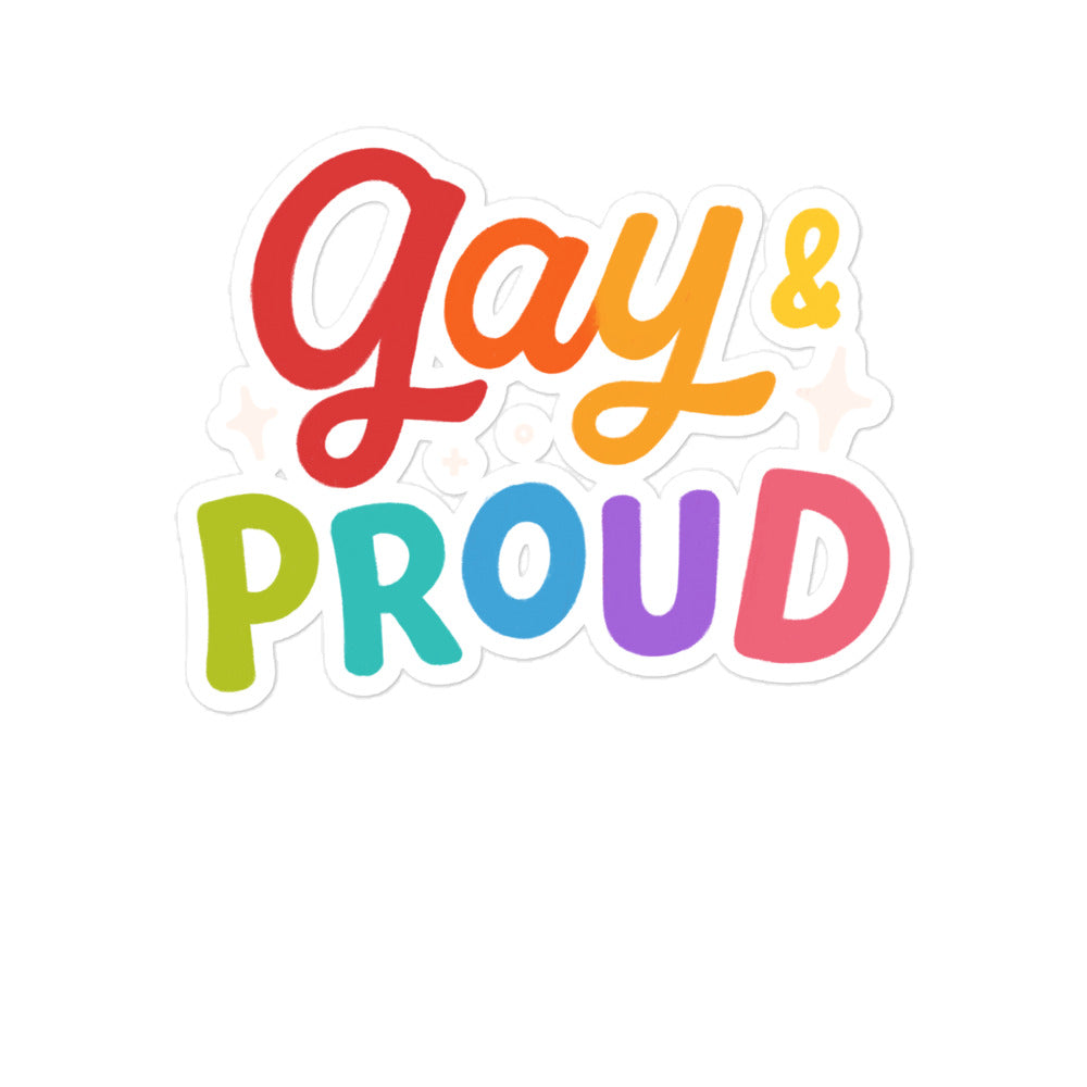 Die-cut sticker reading “gay & PROUD” in bright rainbow-colored lettering