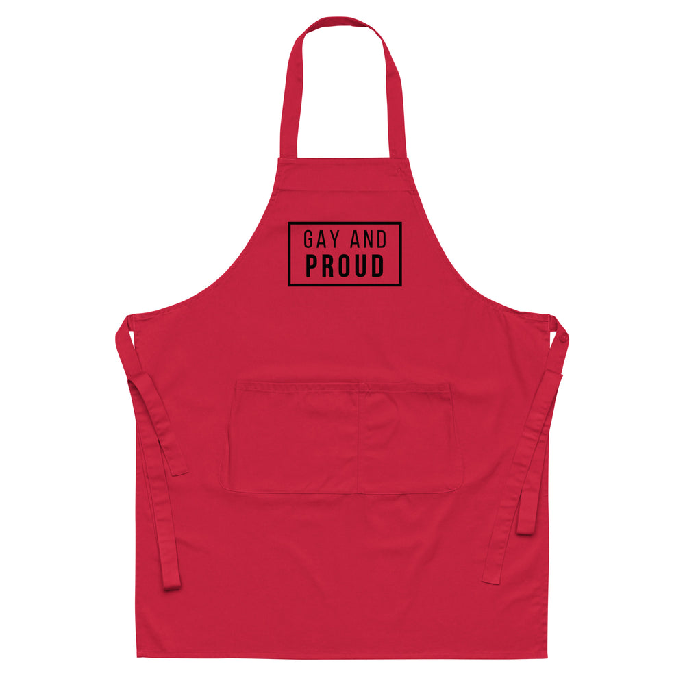 Front view of a red apron with a black-bordered “GAY AND PROUD” chest print and large pocket