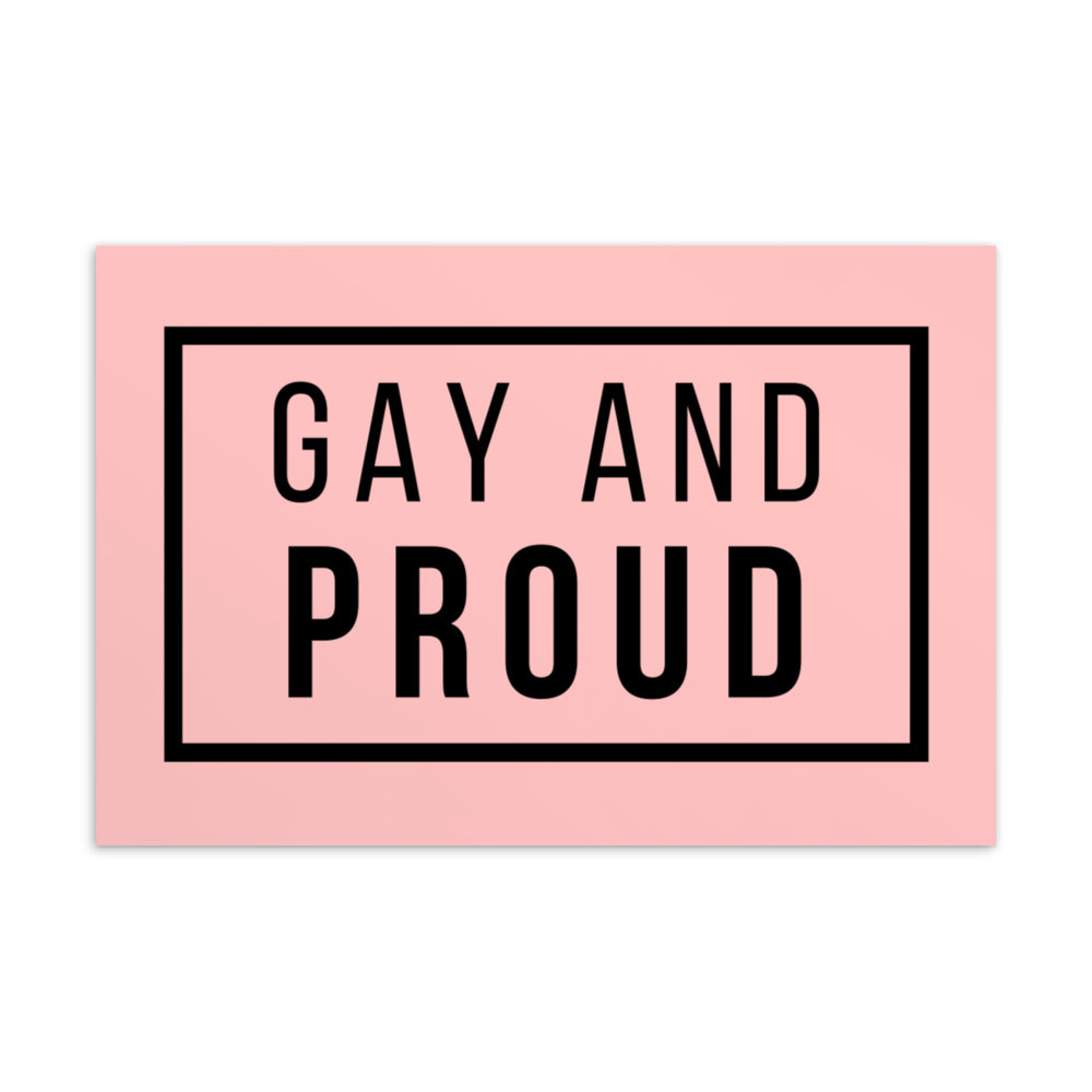 Pink postcard with a black border and bold black text reading “GAY AND PROUD”