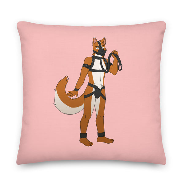 Square pink pillow featuring an orange anthropomorphic pup in black harness gear