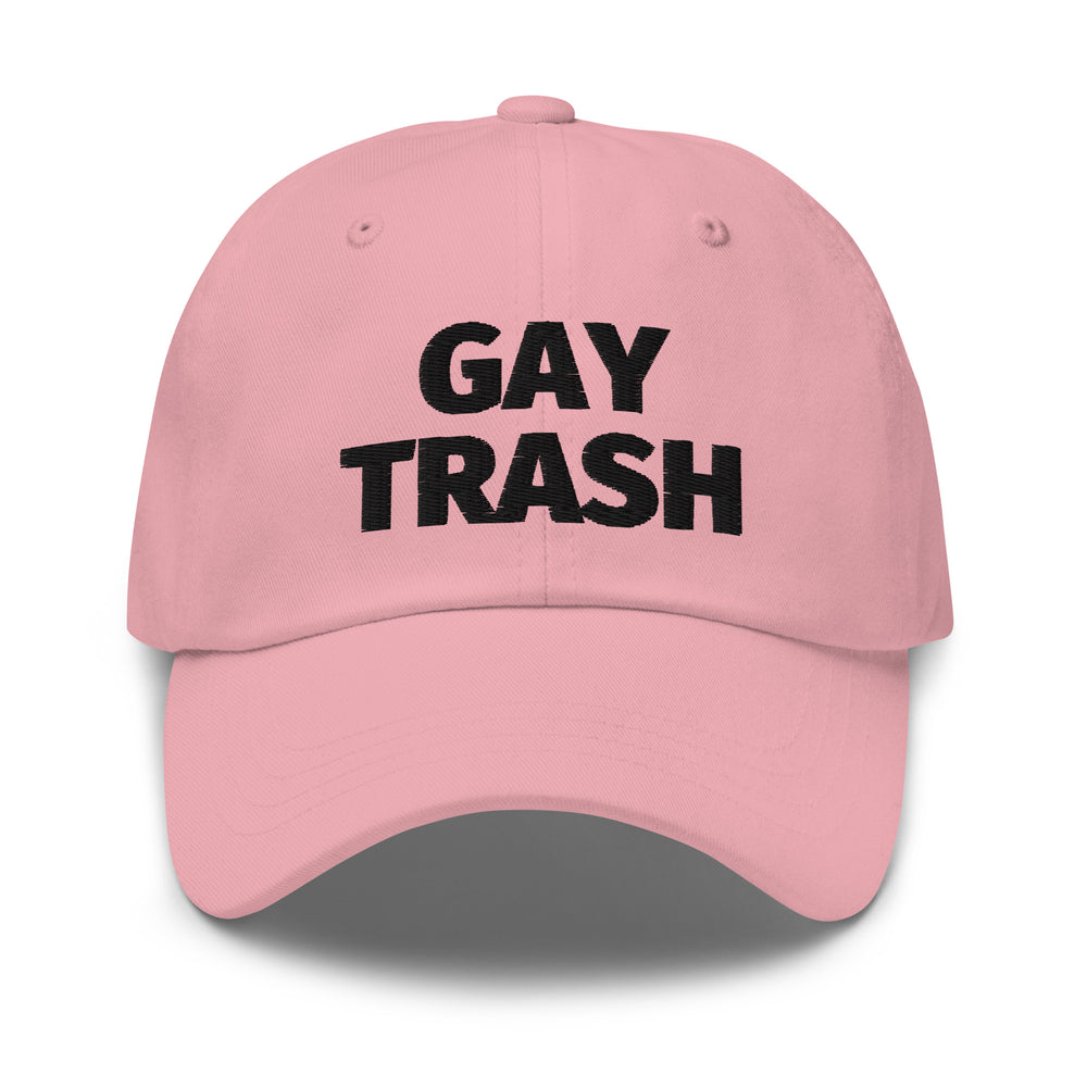 Front view of a pink baseball cap embroidered with “GAY TRASH” in black