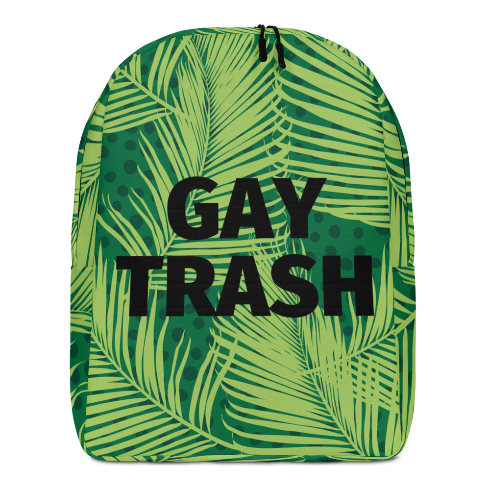 Front view of a green tropical-leaf backpack with bold black “GAY TRASH” text