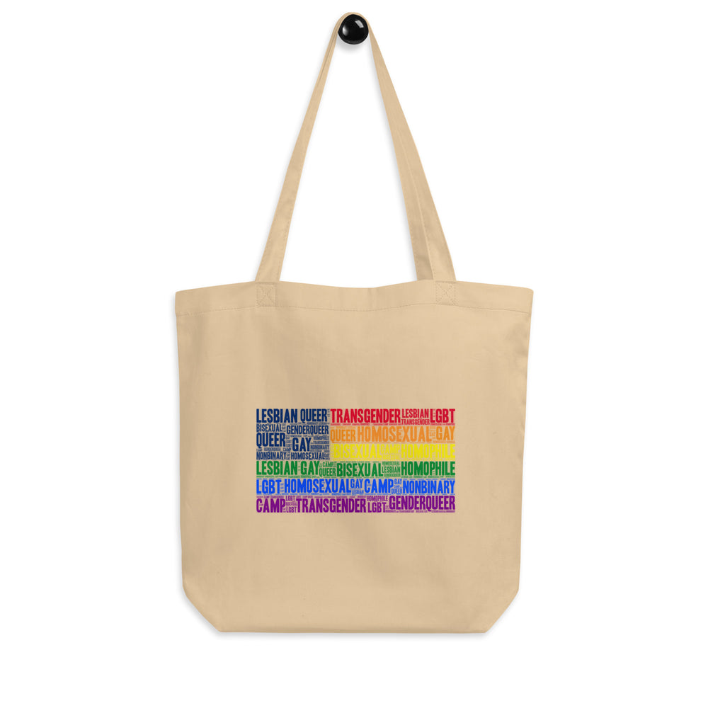 Front view of an oyster canvas tote with rainbow LGBTQ+ word-cloud graphic