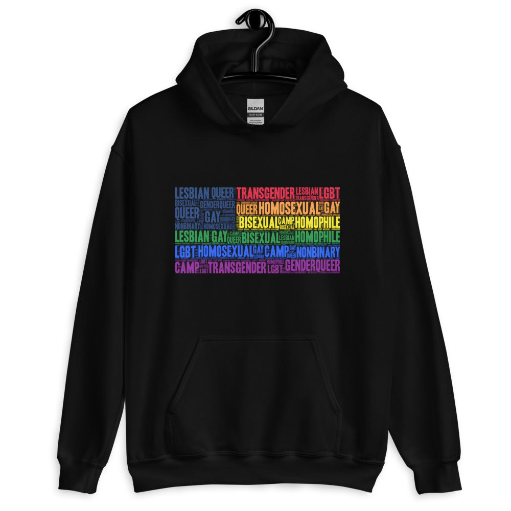 Gay USA Unisex Hoodie with bold LGBTQ+ lettering, worn by a joyful person waving a rainbow flag at a vibrant queer nighttime gathering.