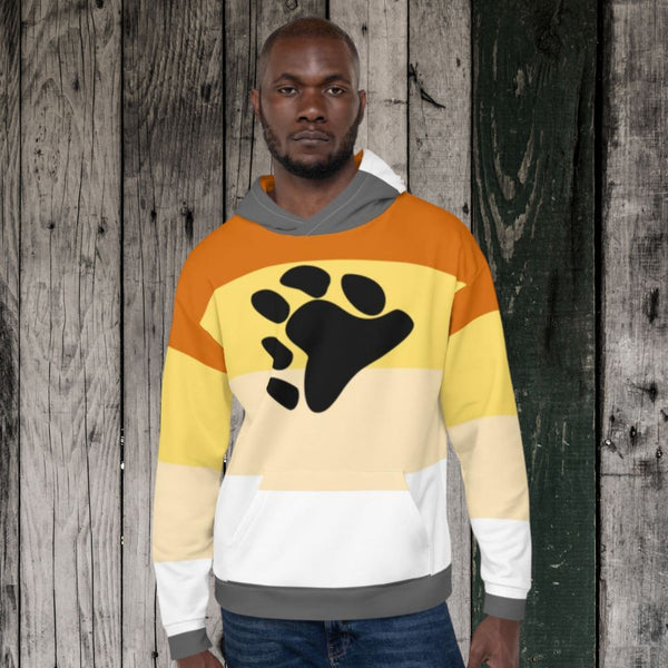 Front-view model wearing an orange, yellow, cream, and white paw-print hoodie