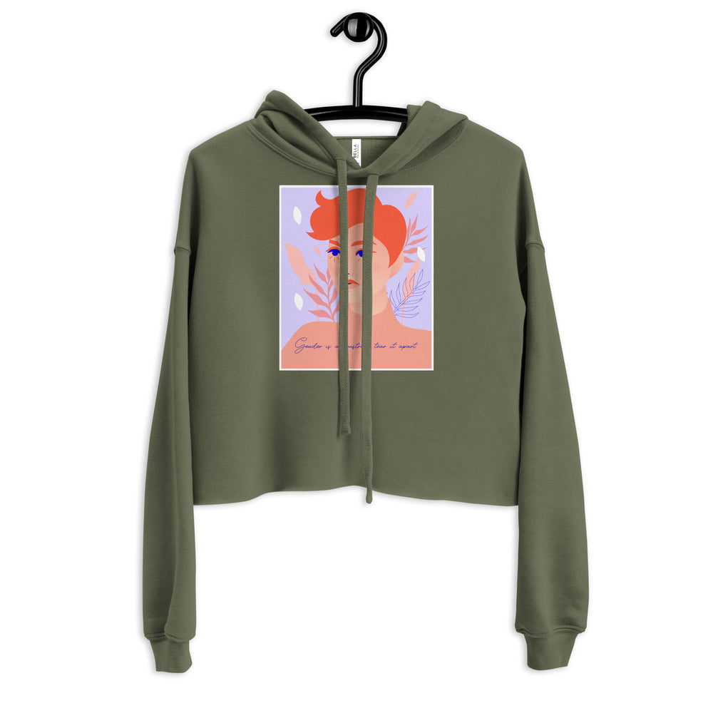 Front view of an olive cropped hoodie with a portrait graphic and “Gender is a construct, tear it apart” text