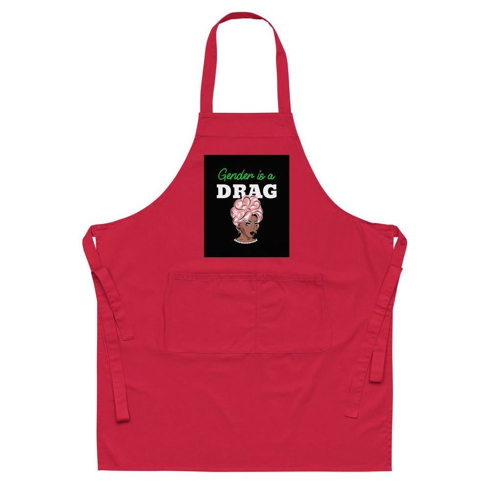 Red apron with neck loop, waist ties, front pocket, and “Gender is a DRAG” graphic