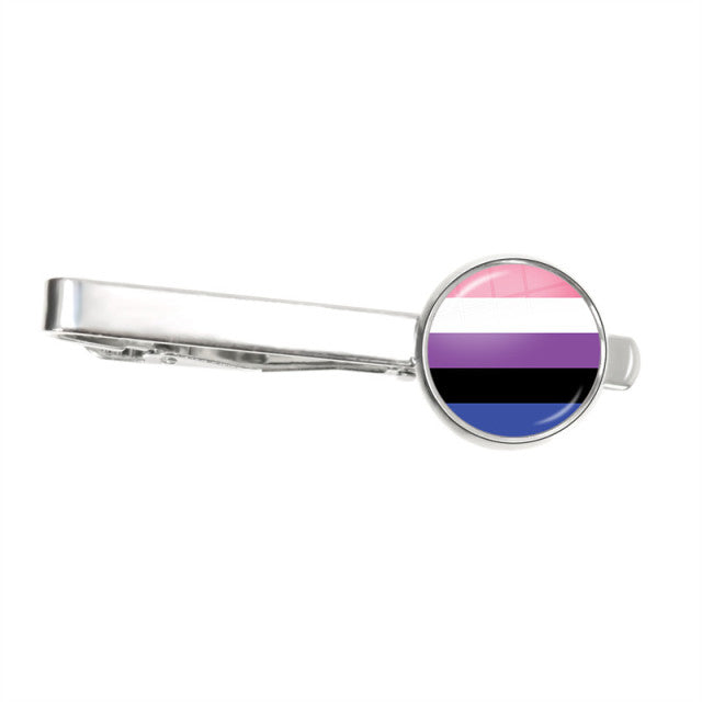 Silver tie clip with a round genderfluid flag emblem in pink, white, purple, black, and blue