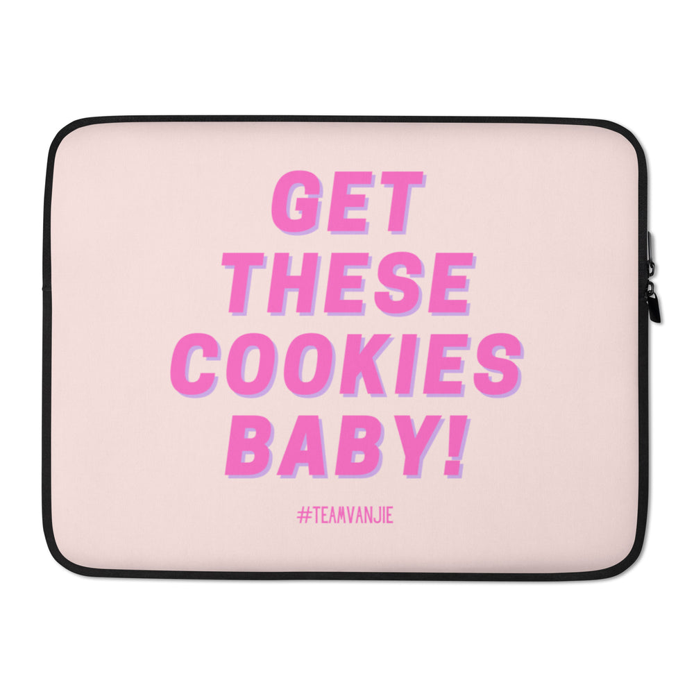 Front-facing pale pink laptop sleeve with bold pink text, “GET THESE COOKIES BABY!”