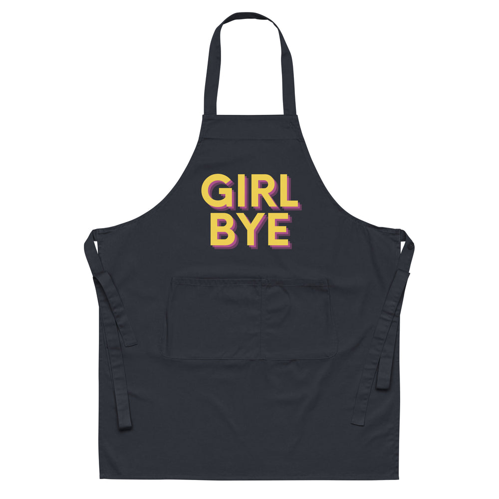 Front view of a black apron with a pocket and yellow-and-pink “GIRL BYE” lettering