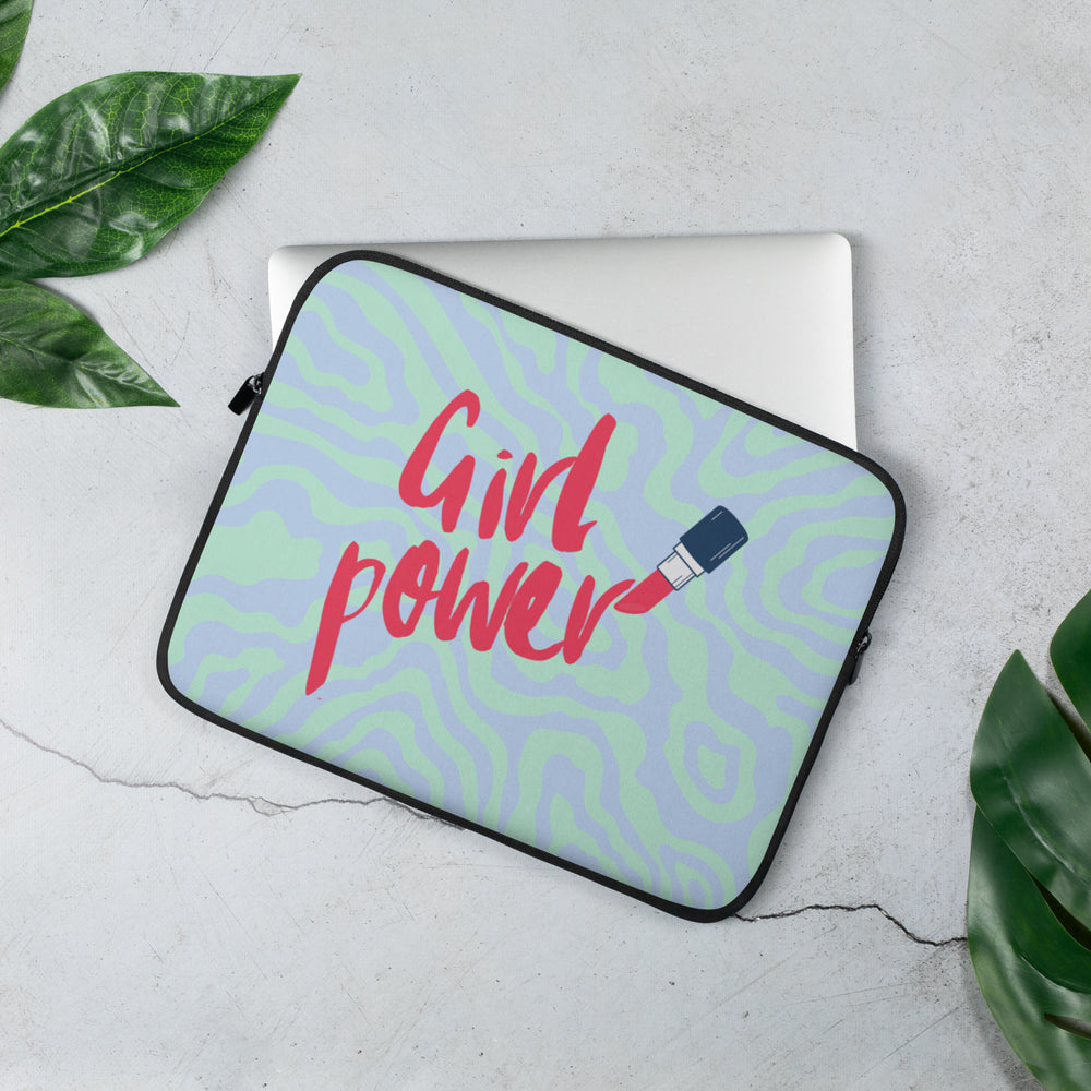 Angled laptop sleeve reading “Girl Power,” with a USB plug graphic on a pastel wavy pattern