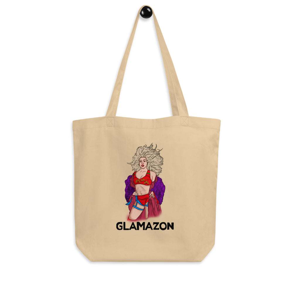 Front view of a beige tote bag featuring a colorful pin-up woman and “GLAMAZON” text