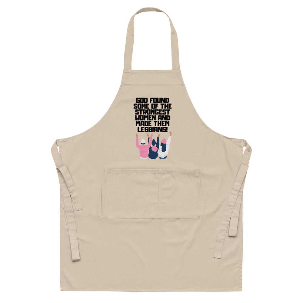 Front view of a beige apron reading “God found some of the strongest women and made them lesbians!”