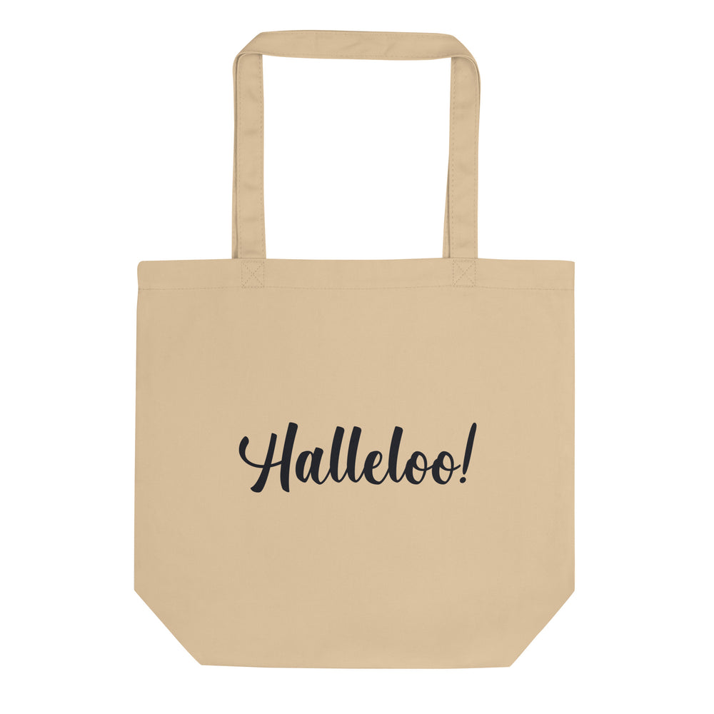 Front-facing beige tote bag with black script reading “Halleloo!”