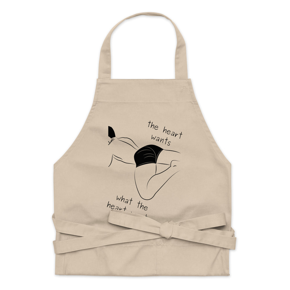 Beige printed apron; organic cotton apron with “The Heart Wants What The Heart Wants” design