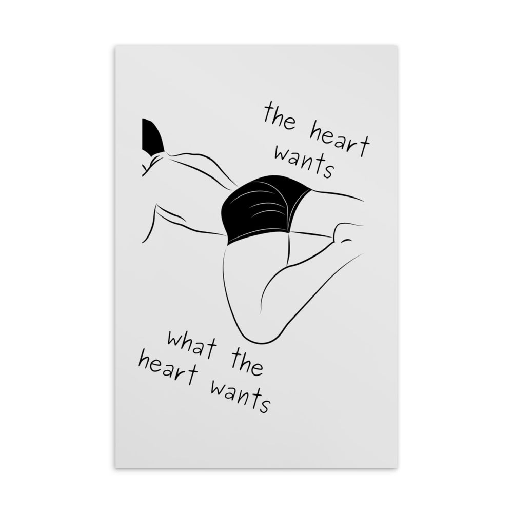 Postcard with a black line drawing of a reclining nude figure and “the heart wants what the heart wants”