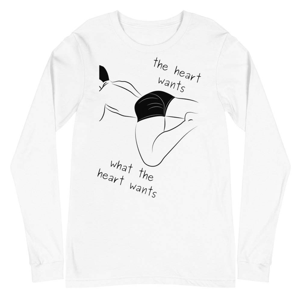 White long-sleeve shirt with black reclining figure and “The heart wants what the heart wants” text