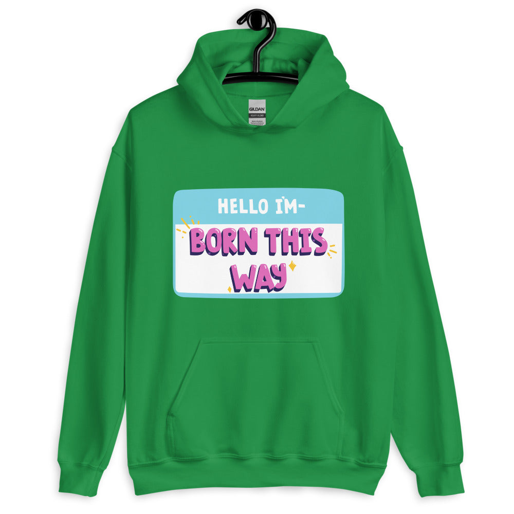 Front view of a green pullover hoodie reading “HELLO I'M—BORN THIS WAY”