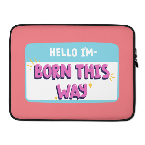 Front view of a pink laptop sleeve reading “HELLO I'M- BORN THIS WAY”