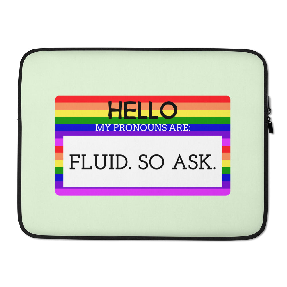 Laptop sleeve with a rainbow-striped "Hello My Pronouns Are Fluid. So Ask." label on glass lit by neon, mist, confetti, glass shards.