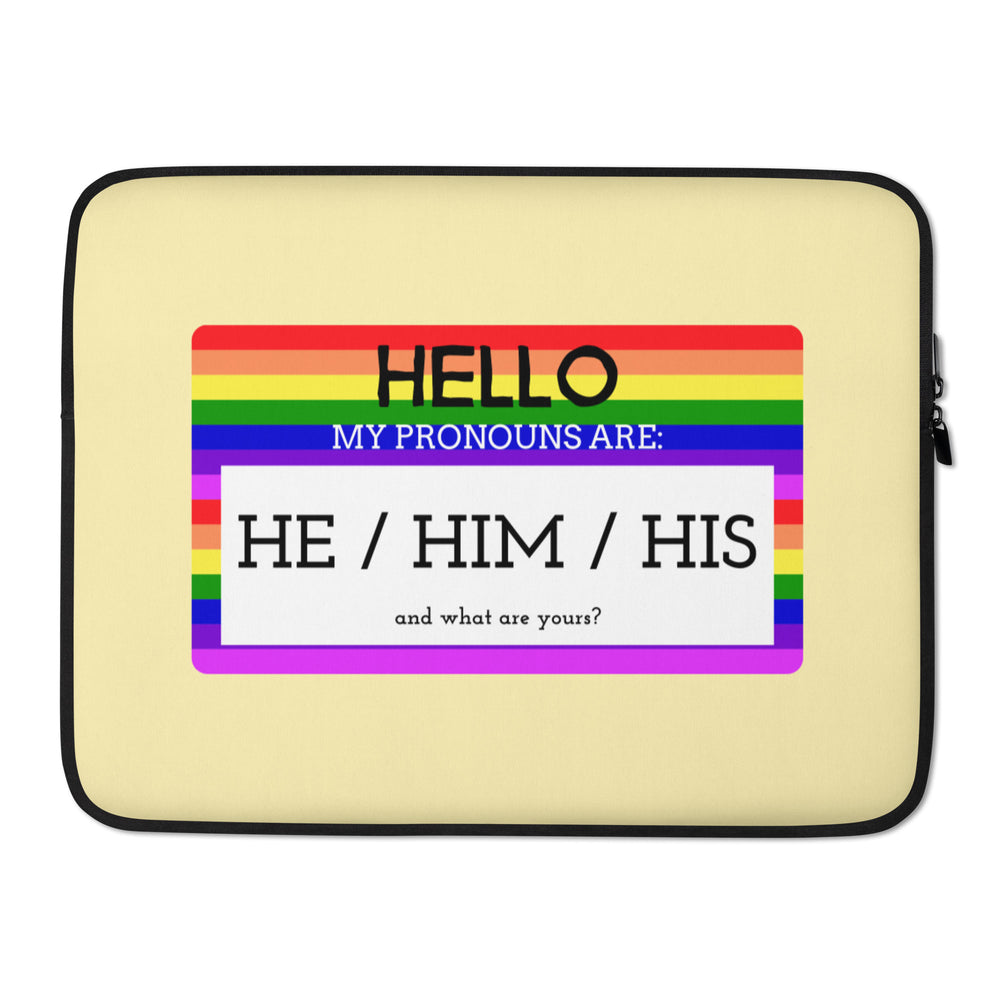 Front view of a beige laptop sleeve with a rainbow panel reading “HELLO MY PRONOUNS ARE: HE / HIM / HIS”