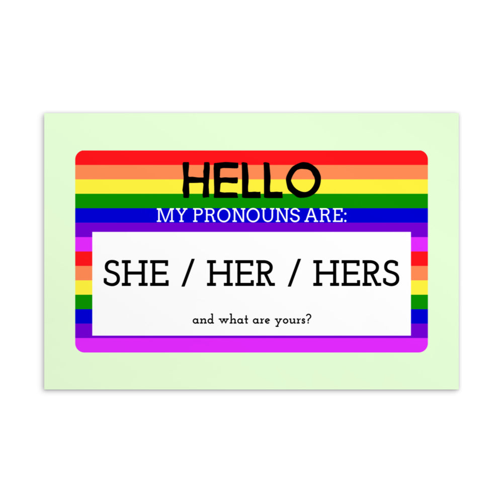 Rainbow-striped postcard reading “Hello, my pronouns are: she / her / hers” and “and what are yours?”