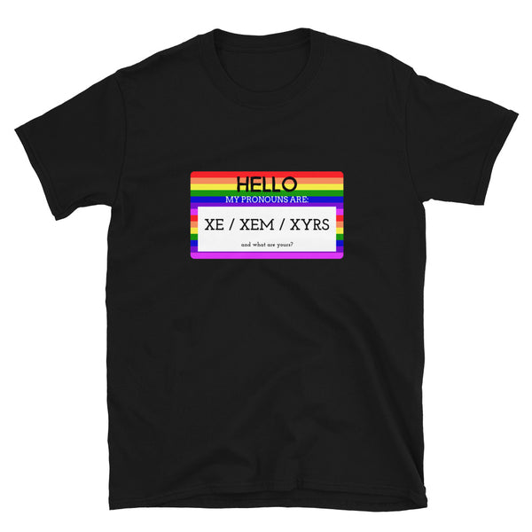 Black T-shirt with a rainbow-bordered pronoun graphic reading “HELLO MY PRONOUNS ARE: XE / XEM / XYRS”