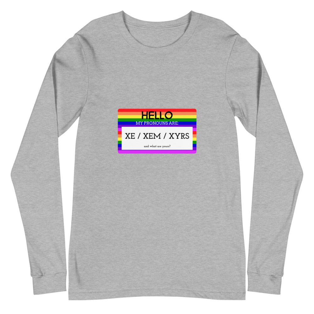 Front-facing heather-gray long-sleeve shirt with a rainbow pronoun card reading “XE / XEM / XYRS”