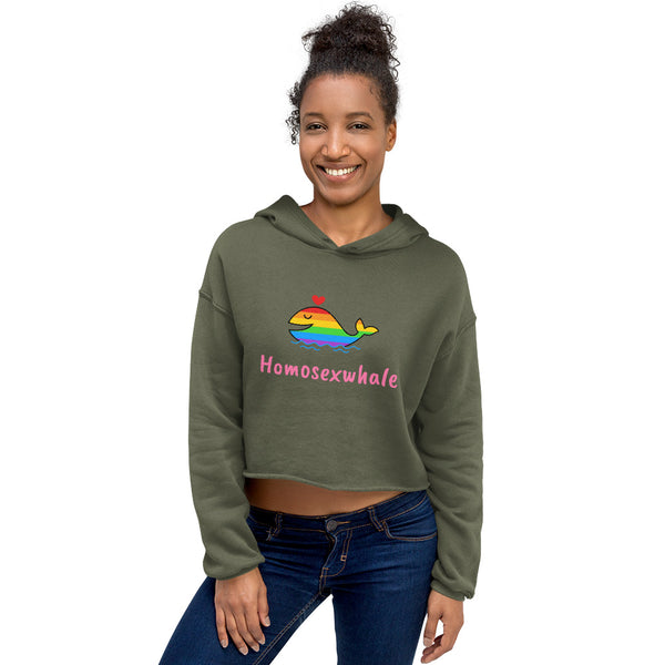 Model wearing an olive cropped hoodie with a rainbow whale and “Homosexwhale” text