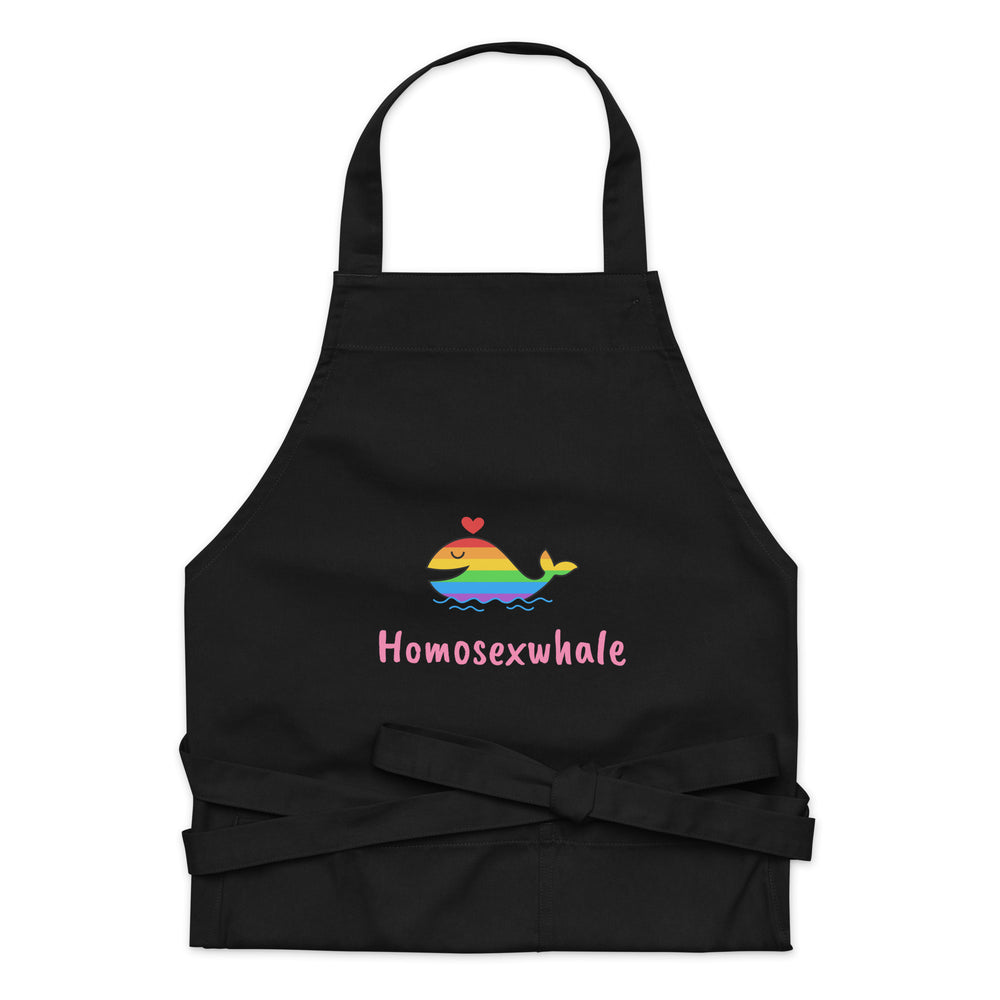 Black apron with a rainbow whale graphic and “Homosexwhale” text, shown front-facing