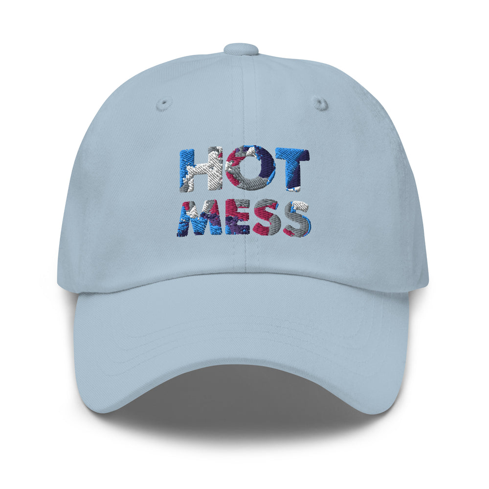 Front view of a light blue baseball cap embroidered with “HOT MESS” in multicolored thread