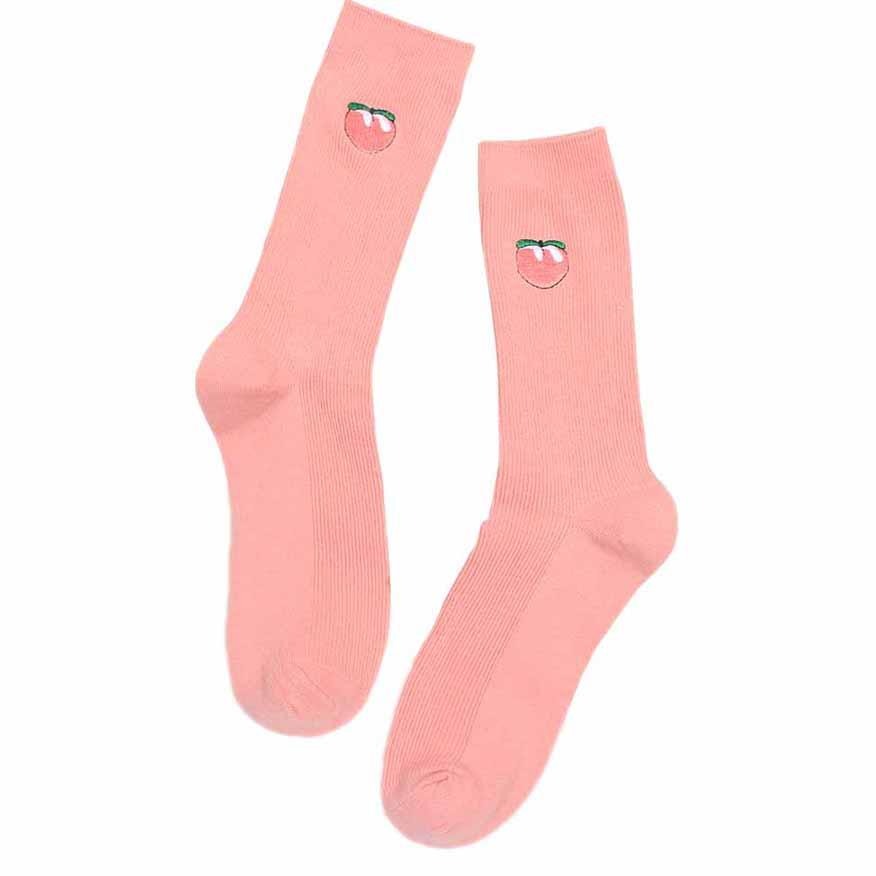 Pair of peach-pink crew socks with matching embroidered peach motifs