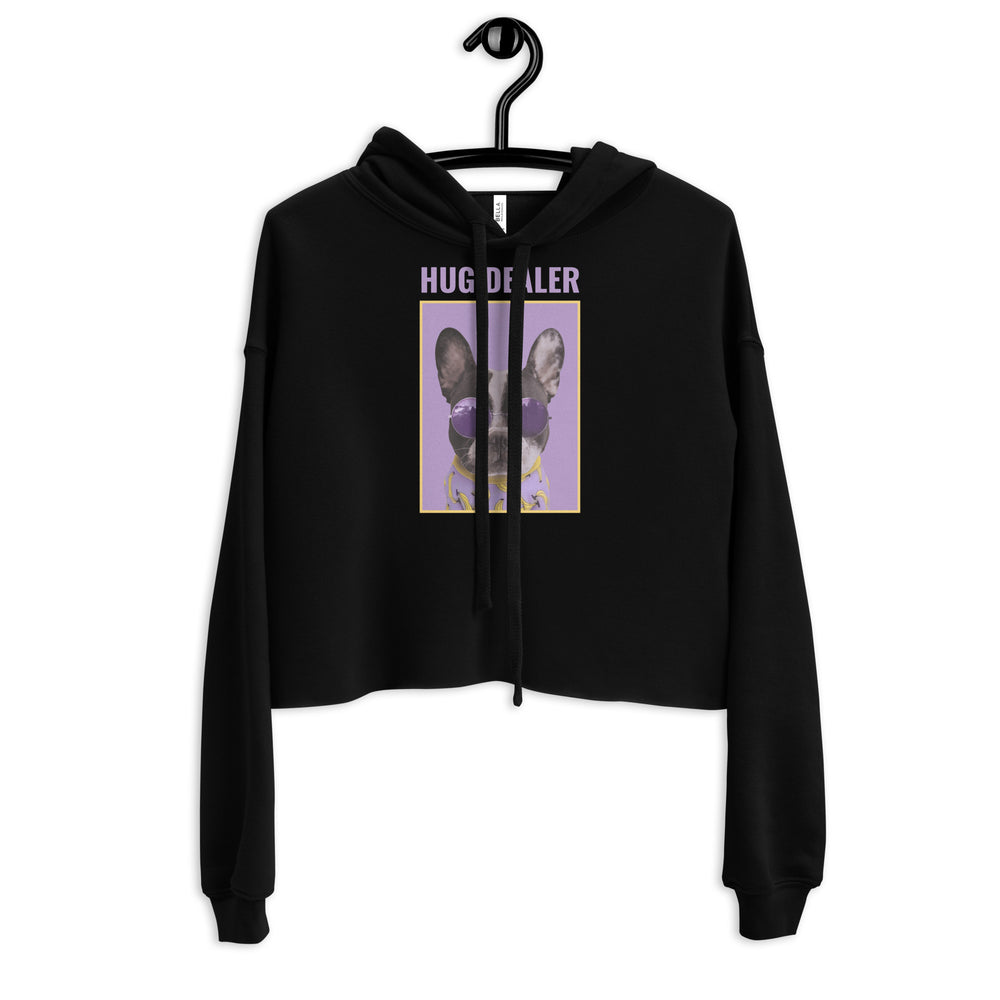 Front view of a black cropped hoodie reading “HUG DEALER,” with a purple dog graphic