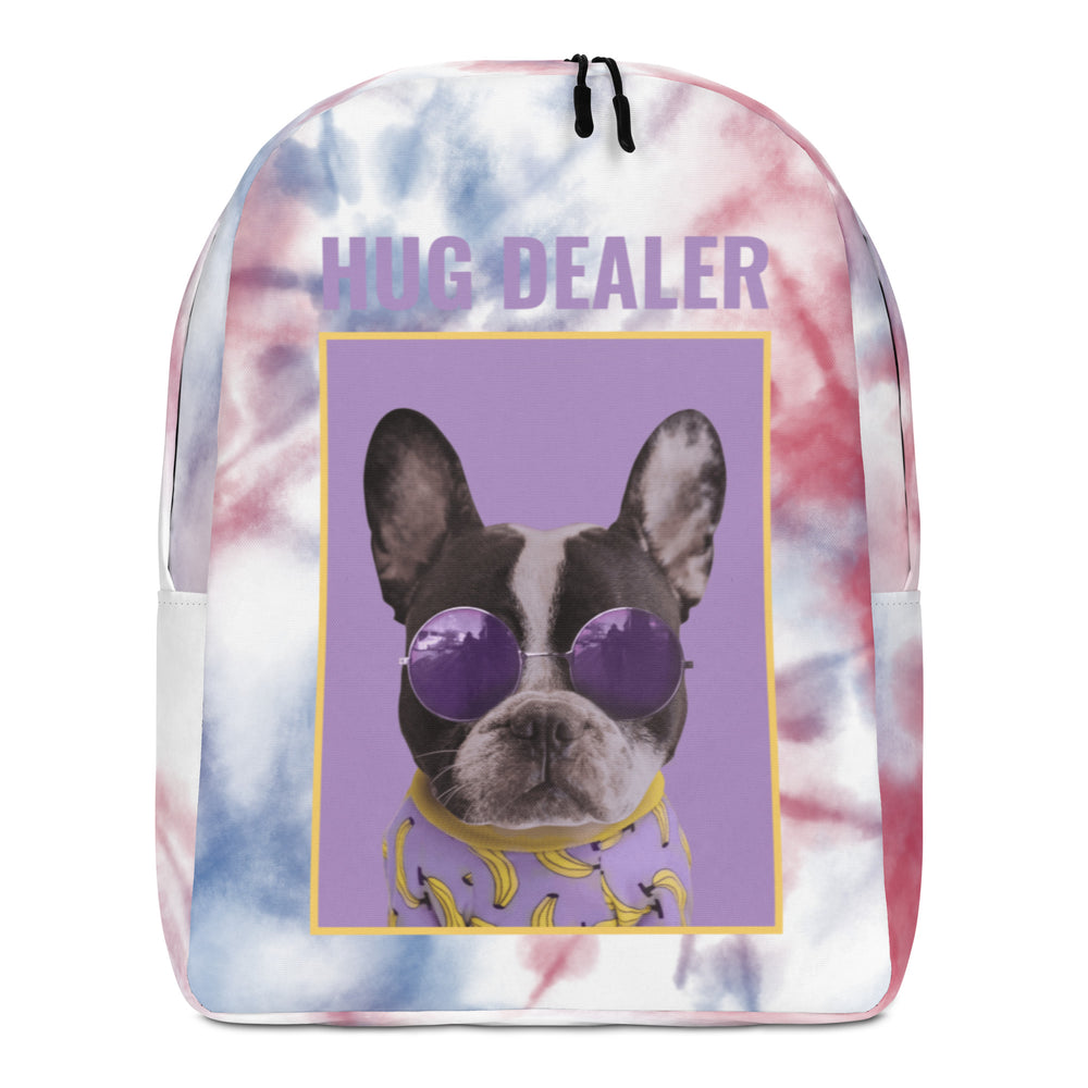 Front view of a tie-dye backpack reading “HUG DEALER,” with a dog in purple sunglasses