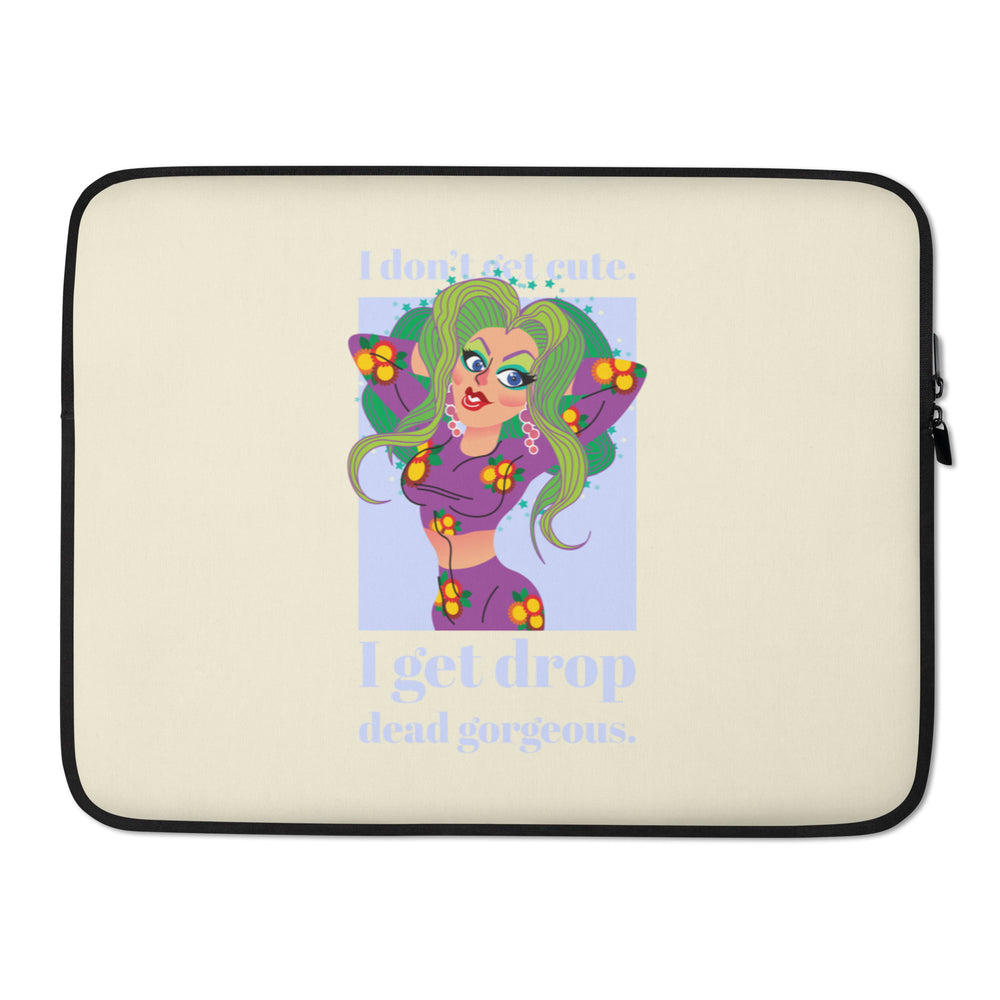 Cream laptop sleeve with black trim, pin-up-style figure, and “I get drop dead gorgeous” text