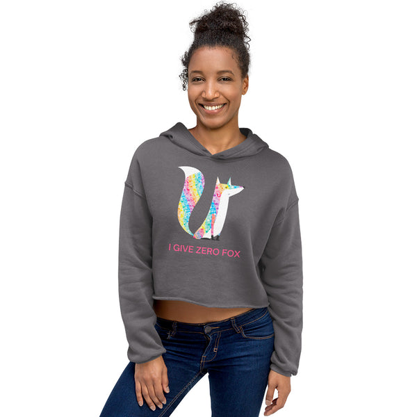 Model wearing a cropped charcoal hoodie with a glittery fox graphic and “I GIVE ZERO FOX” text