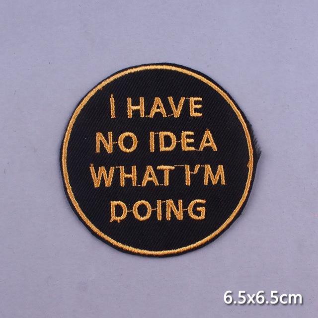 Round black embroidered iron-on patch reading “I HAVE NO IDEA WHAT I’M DOING”