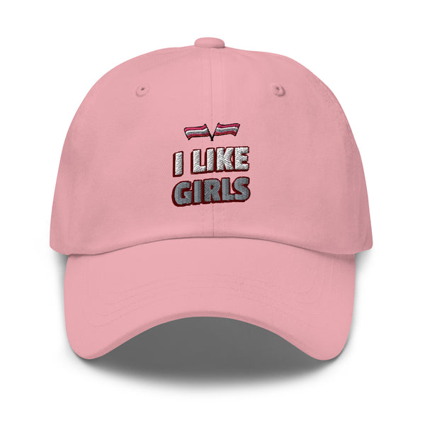 Front view of a pink cap embroidered with “I LIKE GIRLS” and a small flag motif