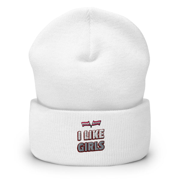 Front view of a white cuffed beanie embroidered with “I LIKE GIRLS” and a pink-striped symbol