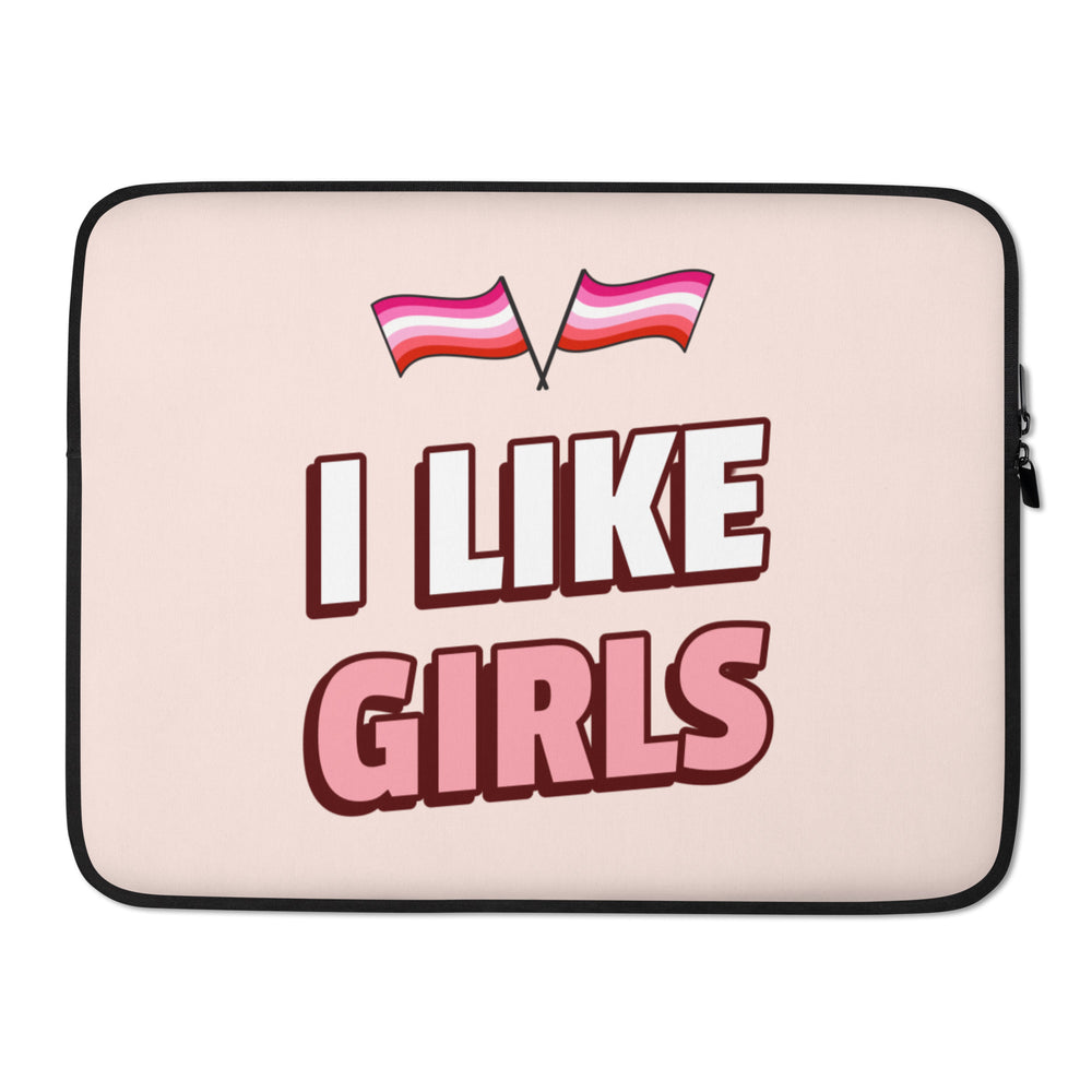 Front view of a pale pink laptop sleeve reading “I LIKE GIRLS,” with two pink-striped flags