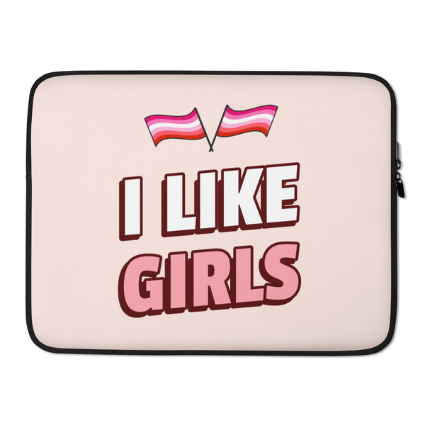 Front view of a pale pink laptop sleeve reading “I LIKE GIRLS,” with two pink-striped flags