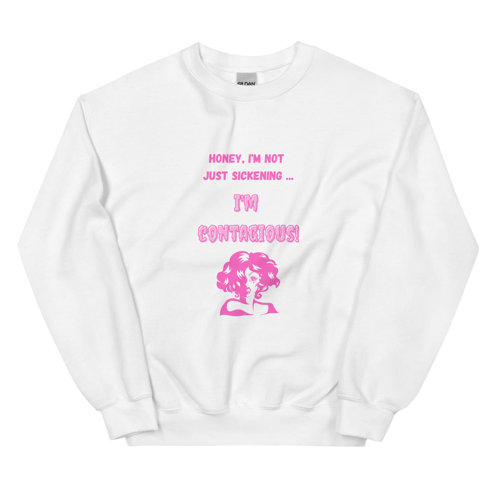 Front view of a white sweatshirt with pink “Honey, I’m not just sickening… I’m contagious!” text and a woman illustration