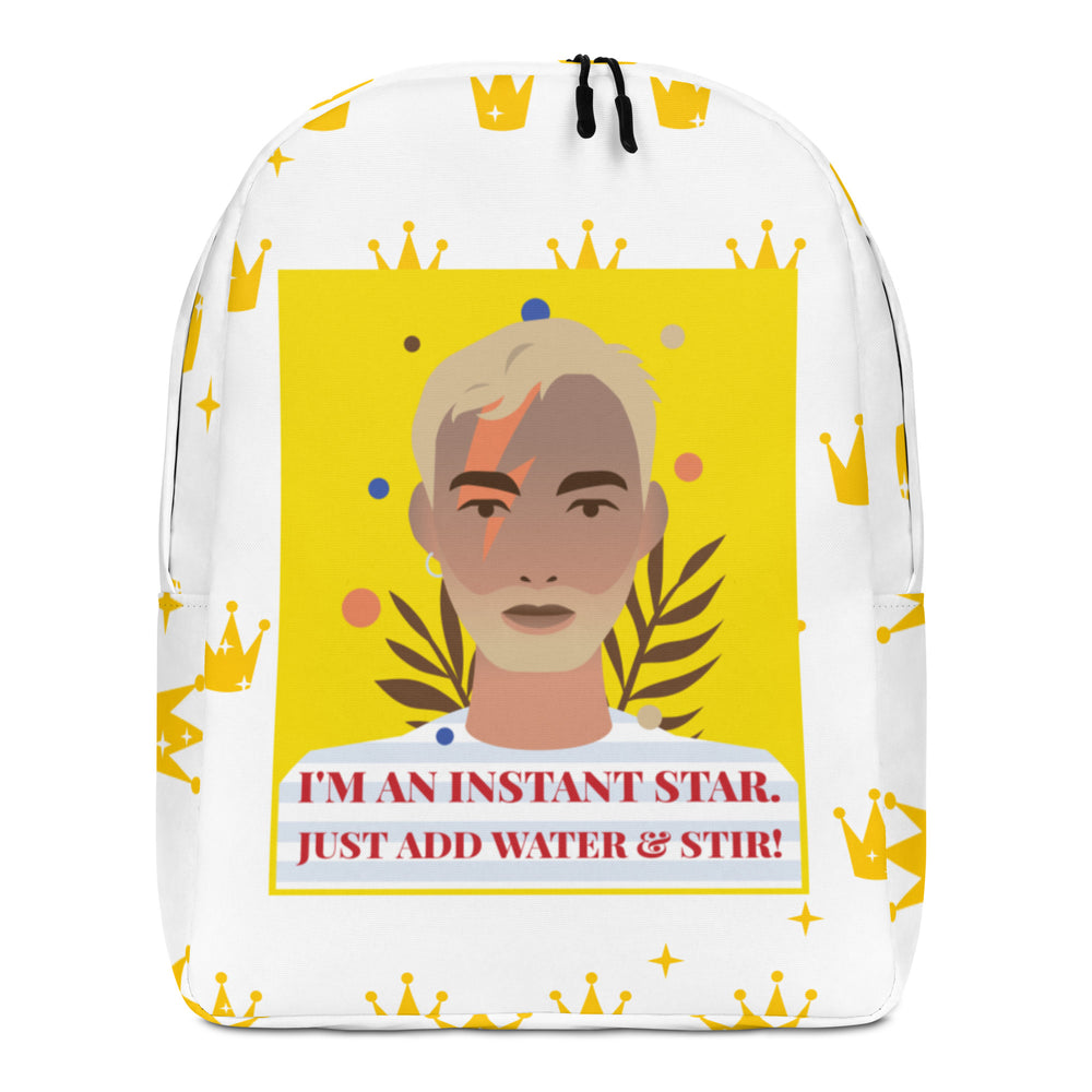 Front view of a white backpack with a crown pattern and portrait reading “I'M AN INSTANT STAR. JUST ADD WATER & STIR!”