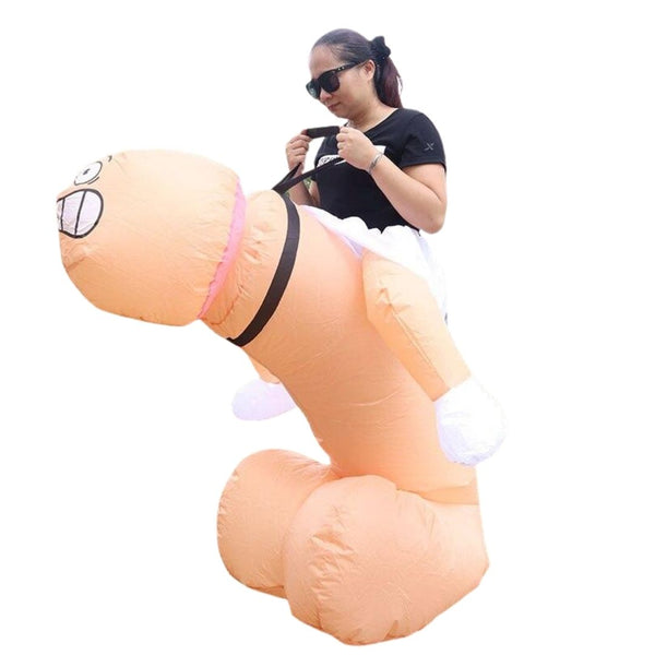 Person wearing an inflatable penis costume with angry cartoon face and black harness straps