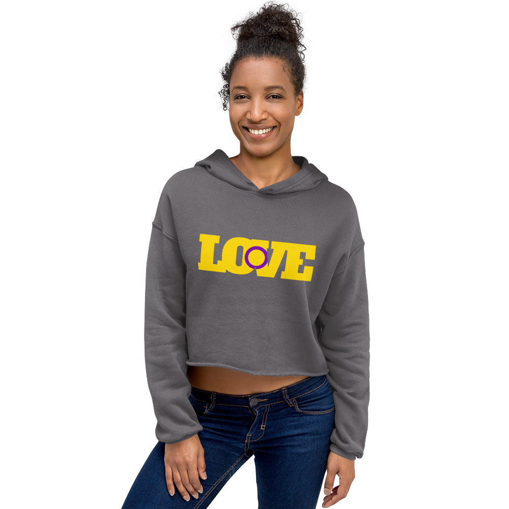 Model wearing a gray cropped hoodie with yellow and purple LOVE lettering