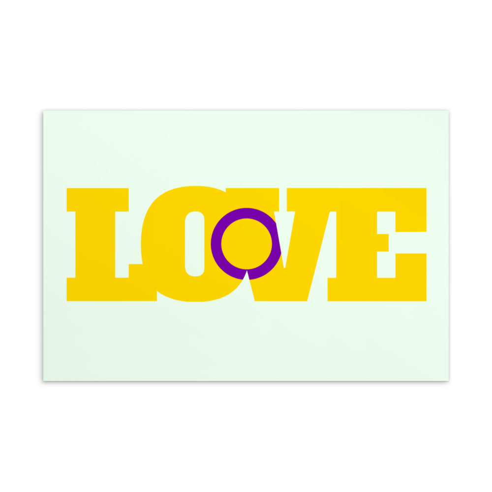 Postcard with large yellow and purple “LOVE” lettering on a pale green background